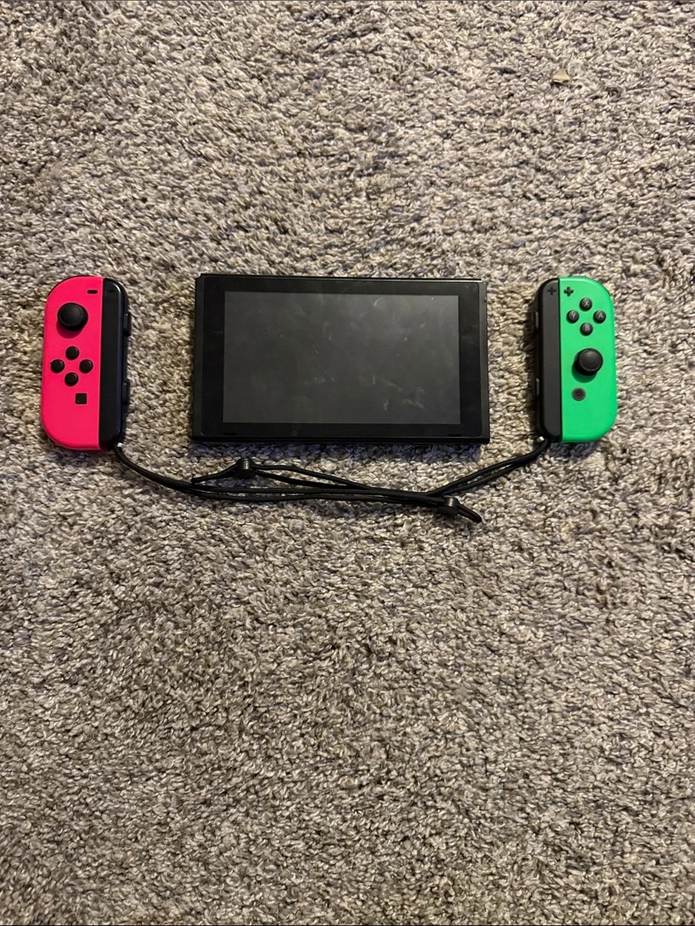 Nintendo Switch with Pink Left and Green Right Joy‑Con